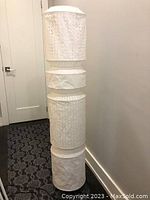Full view of the vintage IKEA floor lamp standing 55 inches tall with four cylindrical rice paper shades stacked.