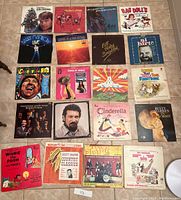 Overview of 20 vinyl LP records laid out on the floor showing album covers with various artists including Glen Campbell, Rusty Draper, Gladys Knight, Tennessee Ernie Ford, and others.