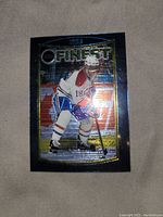 Front of the Valeri Bure Finest hockey card showing holographic image of player in white and red uniform on ice.