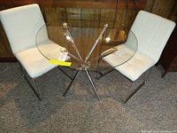 Front view of table and two chairs