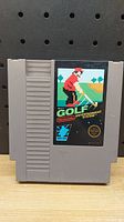 Front of the Nintendo Golf NES cartridge showing the label artwork and branding.