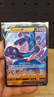 Front of Pokemon Lucario V trading card showing artwork, HP, and moves.