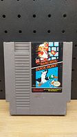 Front view of the Nintendo NES Super Mario Bros. / Duck Hunt cartridge showing label artwork.