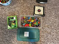 View of the mini action figures assortment including the Green Lantern boxed figure and target game.