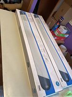 Two boxed TERK TV antennas on a table showing model CTV55 and amplified indoor/outdoor capabilities