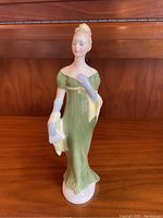 Front view of the Royal Doulton Lorna figurine showing detailed dress and face.