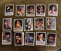 Front side of 15 Wrestlemania wrestling cards depicting action shots of wrestlers during matches and posing.