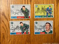 Fronts of four 1968-69 O-Pee-Chee hockey cards featuring Joe Szura, Ab McDonald, George Swarbrick, and Bryan Watson