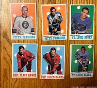 Front view of six vintage 1970-71 O-Pee-Chee hockey cards featuring portraits of Val Fonteyne, Lowell MacDonald, Bob Plager, Chico Maki, Doug Jarrett, and Jim Lorentz.
