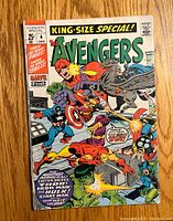 Front cover of The Avengers King-Size Special #4 comic featuring The Avengers in battle.