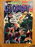 Front cover of the G.I. Combat #143 comic showing action scene with a haunted tank and soldier, bright colored vintage comic art.