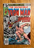 Front cover of The Invincible Iron Man #120 comic book featuring Iron Man and Submariner action scene with title and publication info.