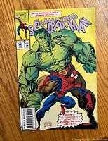 Front cover of The Amazing Spider-Man issue 382 showing the Hulk and Spider-Man in action poses, with text and pricing details visible.