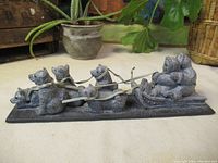Front view of entire carving on cloth background