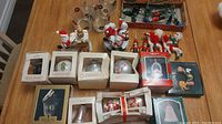 Overview photo showing the entire lot of vintage Christmas decorations, glasses, and light sets.