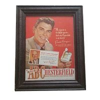 Framed 1948 original cigarette advertisement showing Ronald Reagan holding a cigarette and promoting Chesterfield brand.