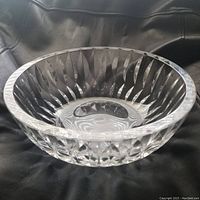Angle showing the full bowl, highlighting thickness and upward flared rim.