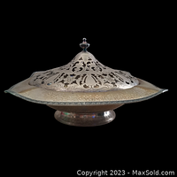 Side profile of the silver-plated lidded serveware showing hammered texture, detailed filigree lid, finial handle, scalloped edges, and overall size.