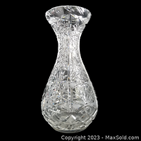 Front view of 14-inch clear Waterford crystal vase with detailed cut patterns.