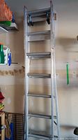 Full view of the convertible aluminum ladder in step ladder form.