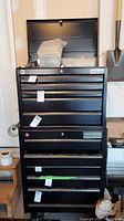Front view of stacked top chest and bottom roller cabinet