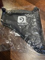 Black nylon carrying case with Vangoa logo, still in plastic wrap