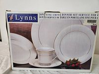 Photo of the Lynns 20-piece fine china dinner set box showing product image and brand detail