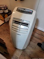 Front view showing louvers, control panel and GoldStar logo