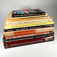 Stack of 10 books on various antiques and collectibles topics, showing titles and condition.