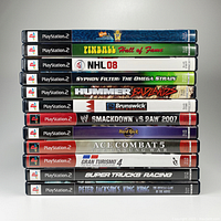 Photo of 12 PlayStation 2 game spine labels stacked vertically showing titles and PlayStation 2 branding on each case.