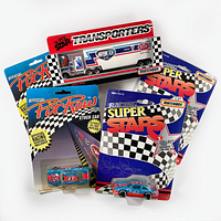Group photo of all five diecast vehicles in original packaging showing blister cards with vintage 1992 graphics and unopened plastic bubbles.