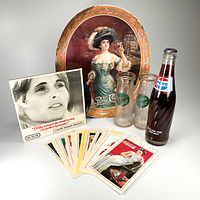 Group image showing the Gibson Girl Pepsi tray, Green Spot bottles, Pepsi bottle, vinyl record, and Coca Cola postcards arranged to display the full lot contents.