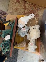 Overview of the animal figurines including elephant shakers, owl, birds, and cast iron key hook.