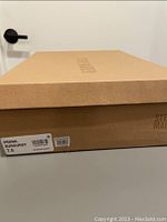 Photo of the Steve Madden shoe box showing model and size label: 'PROWL BURGUNDY 7.5'