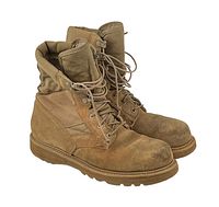 Pair of tan men's combat boots from side angle showing wear and creasing on leather.