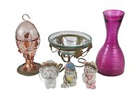 Lot of assorted glassware and figurines showing pink vase, glass candle holder, glass bowl, and three figurines
