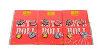Three packs of Hero Charms attached to red card backing with six colorful charms each, sealed in original plastic packaging.