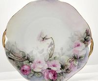 Front view of Royal Silesia cake plate showing pink rose floral hand painted design and gold handles