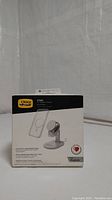 Front of the OtterBox Stand for MagSafe Charger box showing product image and branding.