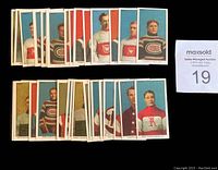 36 vintage style hockey player reprint cards displayed in groups showing various player portraits in early 1900s hockey uniforms.