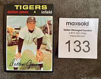 Close-up showing Dalton Jones Tigers baseball card front with team, position and player name