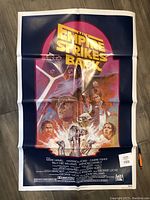 Full view of folded poster, front