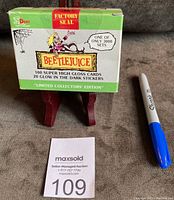 Front view of the sealed green and white Beetlejuice card set box with 'Factory Seal' and text stating limited edition of 3000 sets.