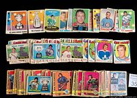 Photo showing arrangement of vintage OPC hockey cards featuring various players and trophies from 1969-70 to 1971-72 seasons.