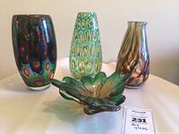 All four art glass pieces together on display