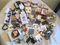 Overview of assorted jewelry pieces laid out on surface