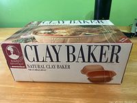 Photo of the product box for the Natural Clay Baker casserole baking dish showing brand, size and natural clay material