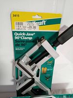 Photo of one Wolfcraft Quick-Jaw 90 Degree Clamp still in its original packaging showing brand, model number 3415, price sticker, and clamp details.