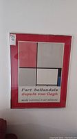 Full view of framed art print showing geometric modernist design and text.