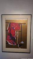 Full view of framed artwork showing red Japanese kimono on clothing stand against gold background